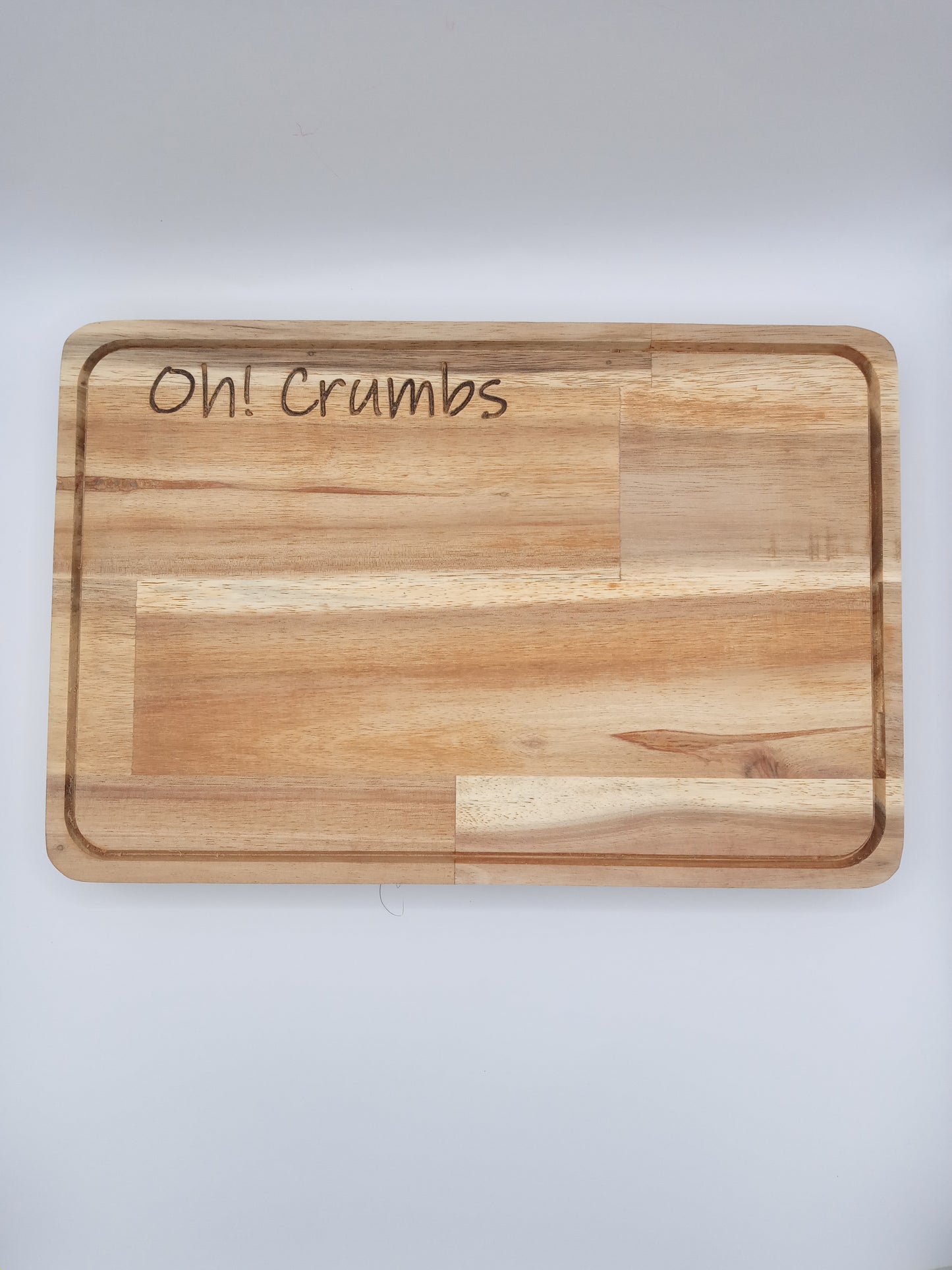 "Oh Crumbs" Acacia Bread board