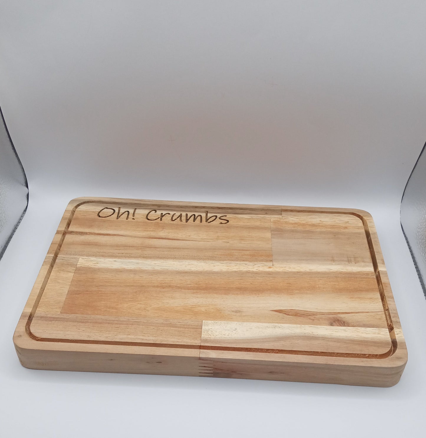 "Oh Crumbs" Acacia Bread board