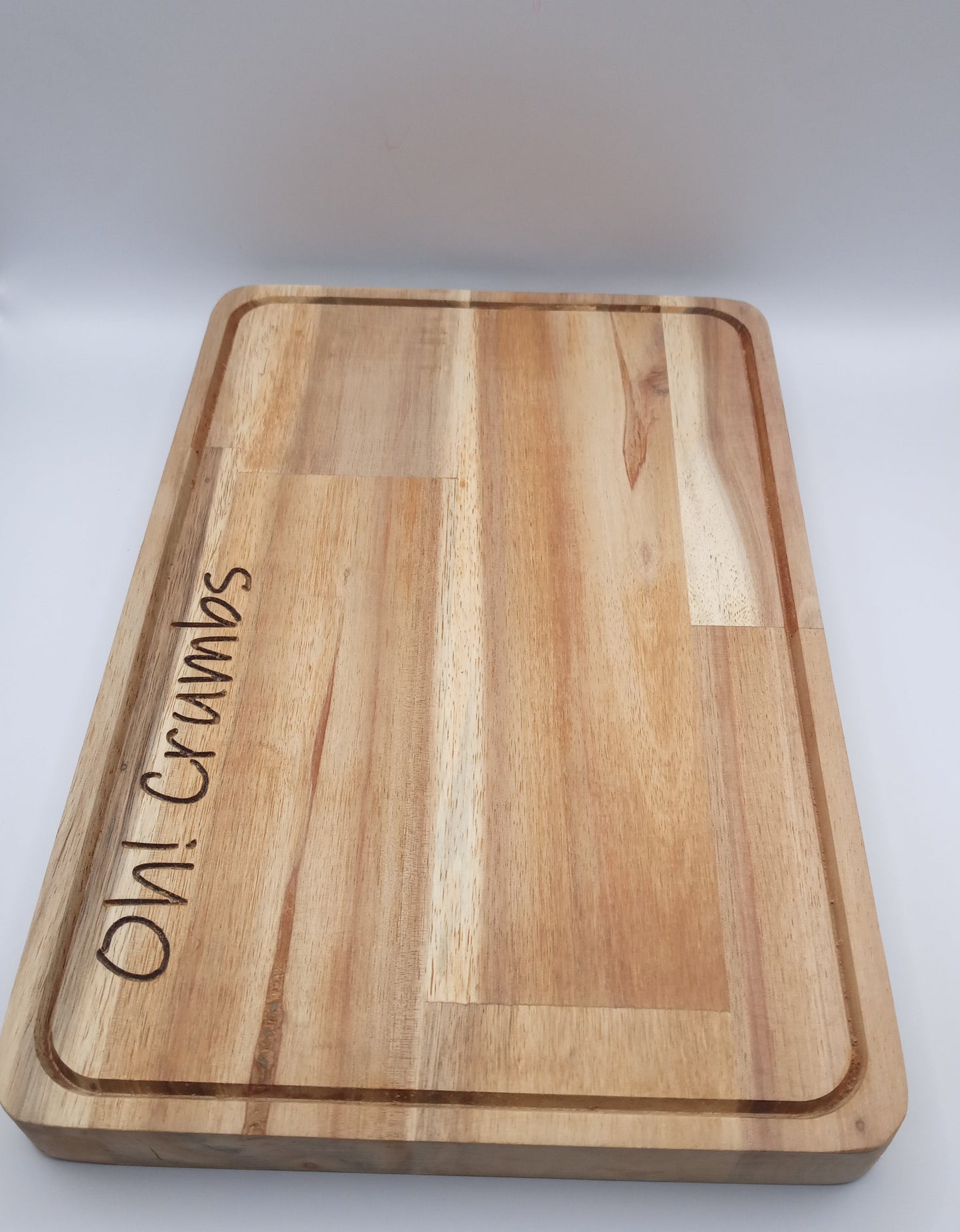 "Oh Crumbs" Acacia Bread board